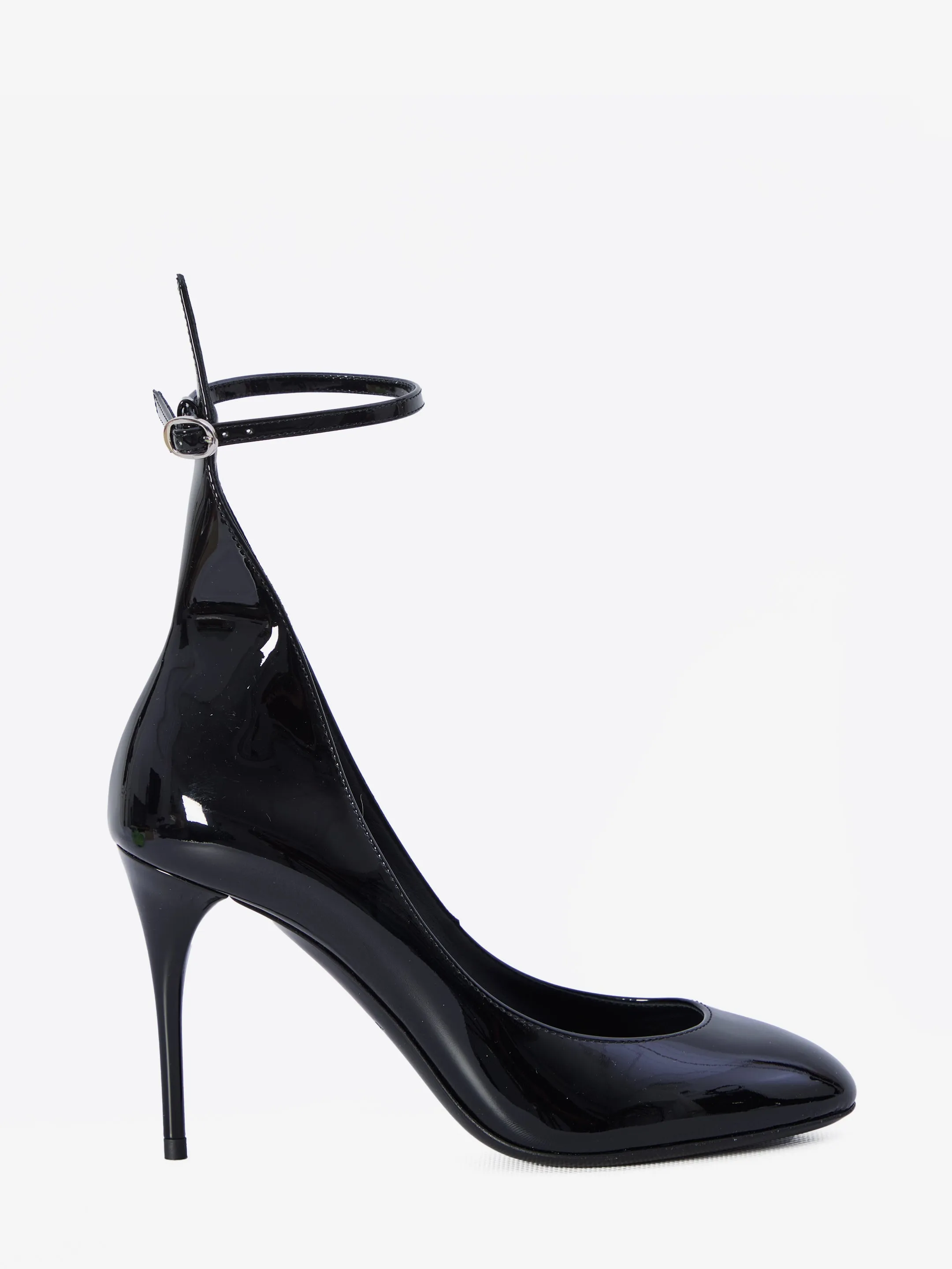 DECOLLETE PUMPS IN PATENT LEATHER