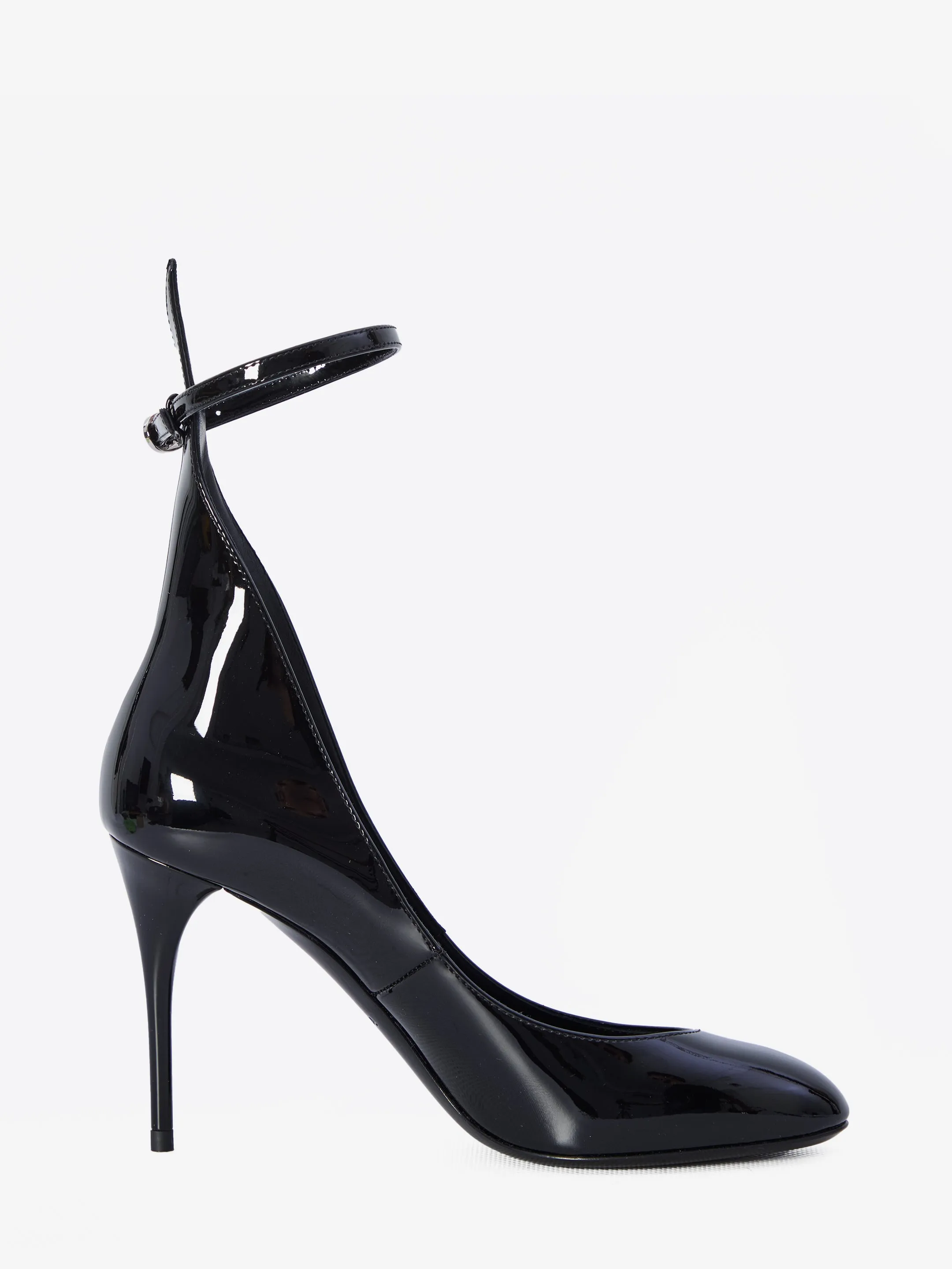 DECOLLETE PUMPS IN PATENT LEATHER